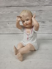 Vintage Gebruder Heubach Piano Baby Hands In The Air Ornament. PBF2002516