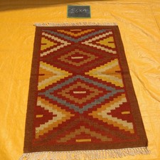 Hand woven wool rug - hand,