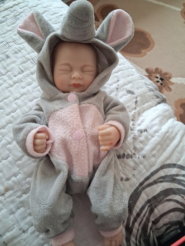 Tiny baby doll - tiny,