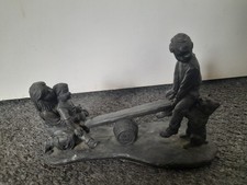 GENESIS BRONZE EFFECT FIGURINE