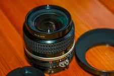 Nikon Nikkor 24mm f/2 Ais  Lens, with HK-2 hood- Nice Condition