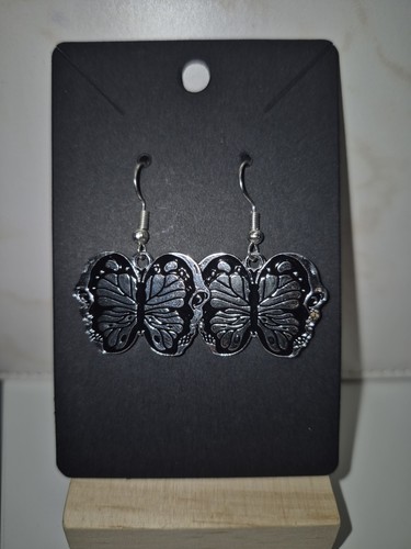 Black silvery butterfly with - silvery,