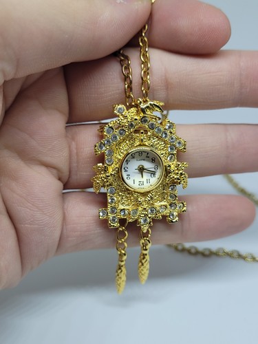 Gold tone cuckoo clock - cuckoo, quartz