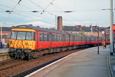 class 303 no 303087 in  stp orange partick