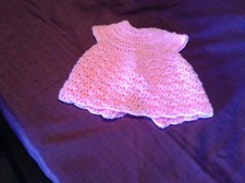 A new hand crochet premature baby girl dress pink