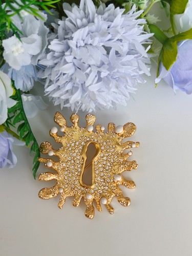 Schiaparelli sun face - sun, brooch