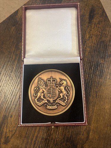 Rare cased military coin - cased,