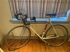 White/red hipster city bike: vintage bicycle 