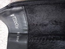 Faux Leather knee high riding boots, size 6, wide calf and not yet been used