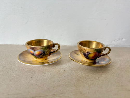 Pair mini royal worcester - of,