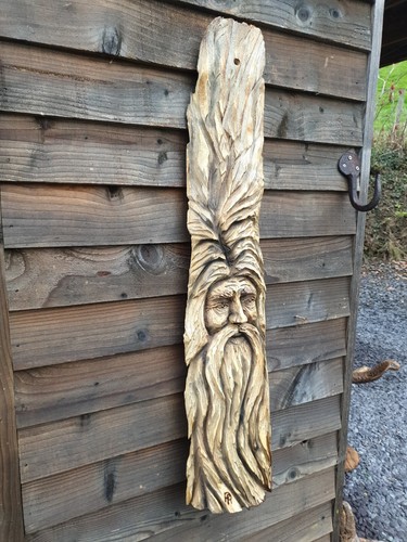 Chainsaw carved green man - chainsaw,