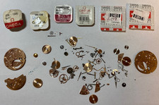 clearance of Omega 600/601 parts. inc 550-1305 600-1160 600-1240 mainspring etc