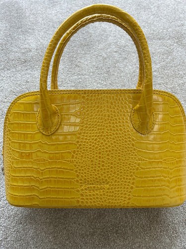 Yellow osprey leather bag