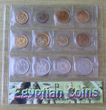 12 Egyptian Coins in Plastic Coin Wallet