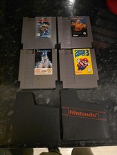 Nintendo NES Game Bundle x 4, Super mario 3, Wrestle mania, Rollergames