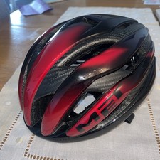 Met Trenta 3K Carbon MIPS Helmet Iradesent color red and black  