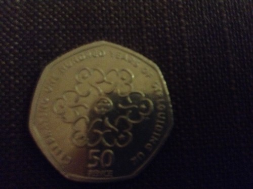Used 50p coin celebrating - used,