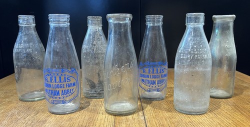 Collection old milk bottles - of,