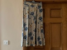 Flared Skirt. Beige Floral