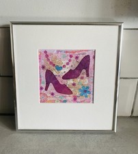 Quilted patchwork art piece in silver frame