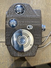 Revere Hanger Eight. 8mm model 81, With Leather Case And 2 Reel Canisters.