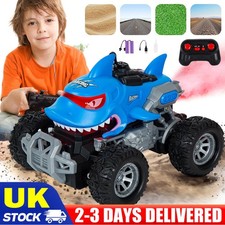 Kids Remote Control Shark Monster Truck Toy Glowing LED Lights & Spray Function