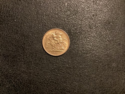 Half sovereign coin gold - half,