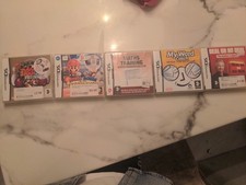 Nintendo DS Game Cartridge Bundle With Cases.