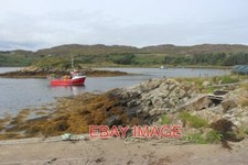 PHOTO  SMALL FISHING BOAT AT
