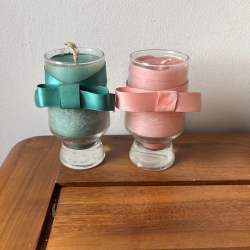 Candles pink and teal - and,