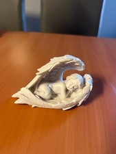 Sleeping resin cherub - , wrapped