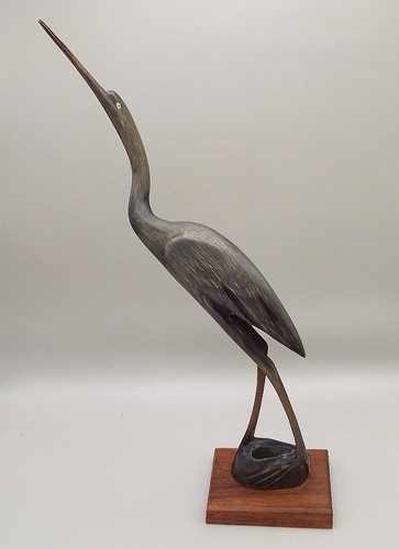 Carved wooden figure an - of,