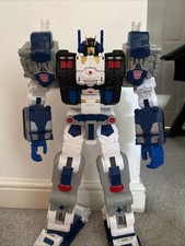 Transformers Generations Titan Class Metroplex Cybertron Action Figure