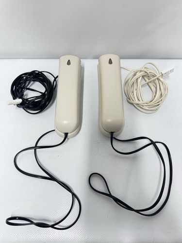 Pair cream corded wall - of,