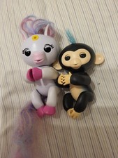  Fingerlings Unicorn and black monkey  interactive figures. Working and cute 