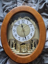 Clock. Small World Rhythm Wall Clock Christmas Song & Melodies Play On The Hour