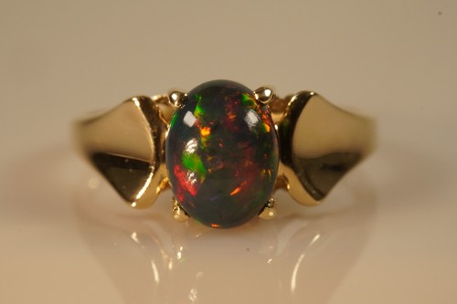 Genuine black opal 9ct gold - black,