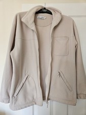 Alice Collins Cream Fleece with zip closure and pockets