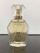 COTY L'AIMANT PARFUM DE