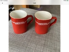 Pair Of Nescafe Coffee Red