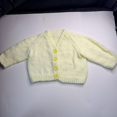 Hand knitted pale yellow - hand,