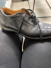 Tods black leather lace up