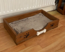 Unique handmade wooden dog bed.