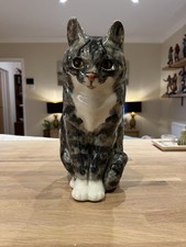 Winstanley grey tabby sitting cat size 5