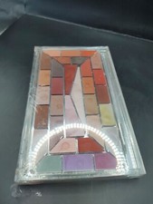 the color institute Lipmobile 35  Shade Lip Gloss Compact w/ applicator.