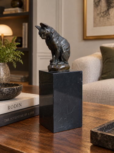 Bronze sculpture seated - a,