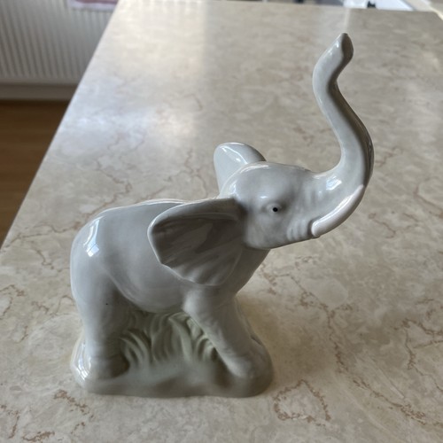 Grey porcelain elephant with - grey,