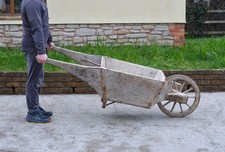 old vintage wooden wheelbarrow