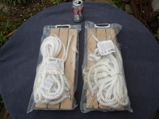 Pair wooden tree swing - of,