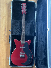Danelectro '59 12 string. Red with black pickguard. Includes hard case.